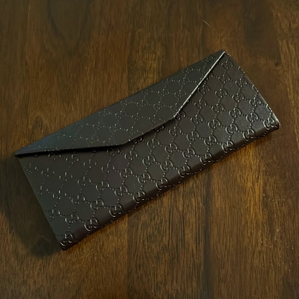Gucci sunglasses case, brand new.